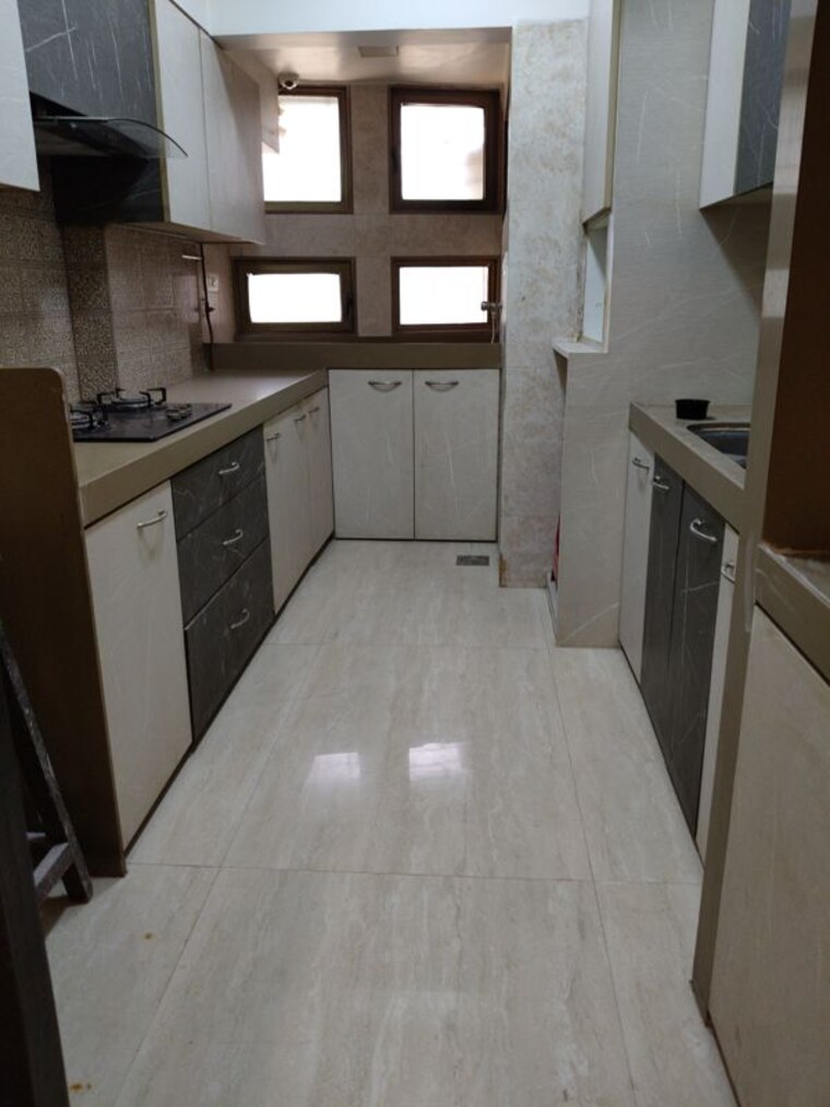 Kitchen, romell-serenity 2 Bedroom 950 Sq.Ft. Apartment In Oshiwara Mumbai 10449233