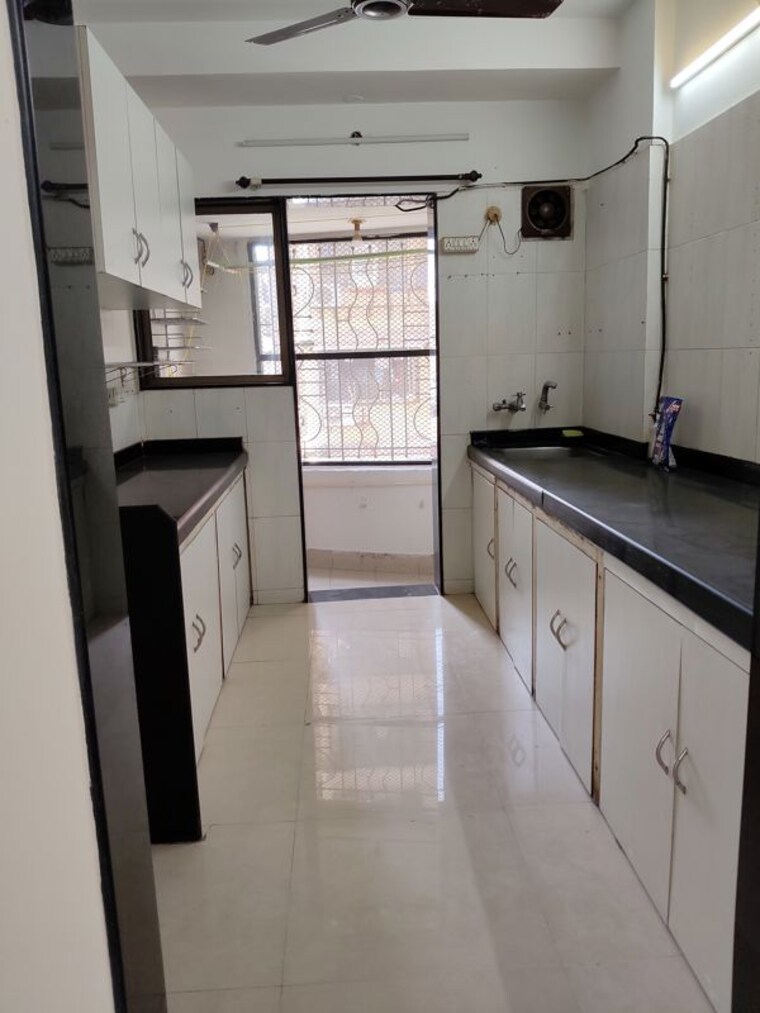 Kitchen, romell-serenity 2 Bedroom 1000 Sq.Ft. Apartment In Oshiwara Mumbai 10449262