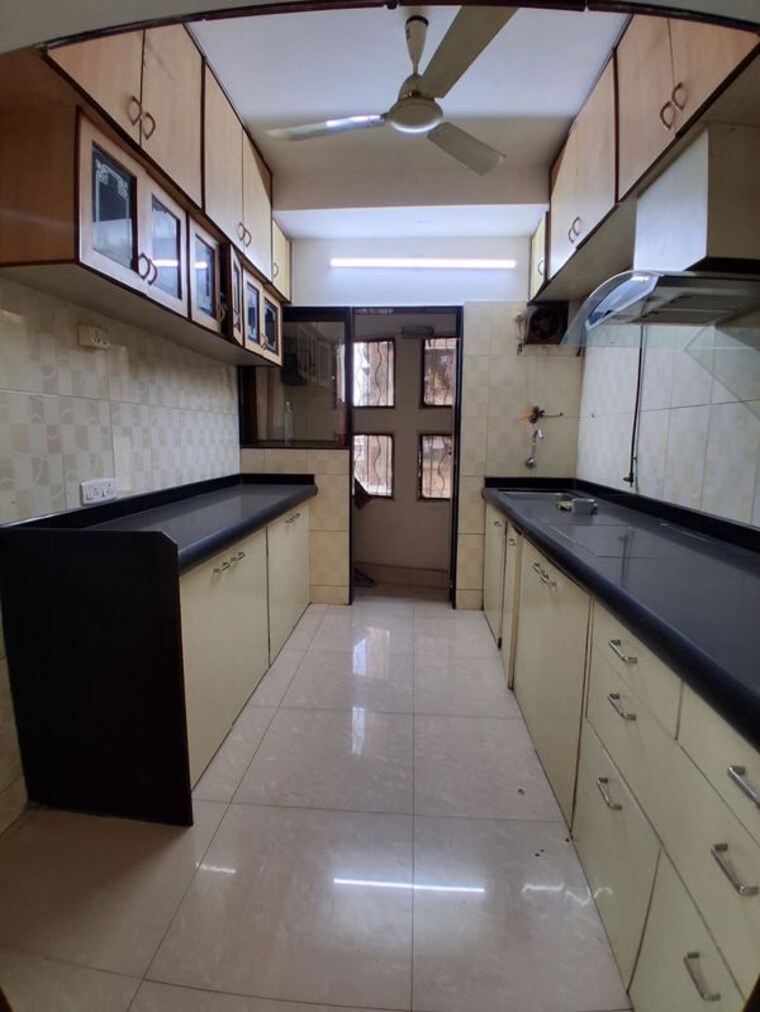 Kitchen, evershine-greens 2 Bedroom 1050 Sq.Ft. Apartment In Andheri West Mumbai 10449272