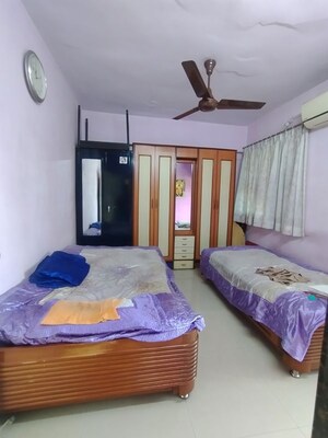 Bedroom in 2 BHK Apartment at Shreerang CHS, Shrirang Society – for Sale