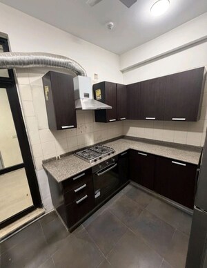 Kitchen in 4 BHK Apartment at Unitech Habitat, Pi Greater Noida – for Rent