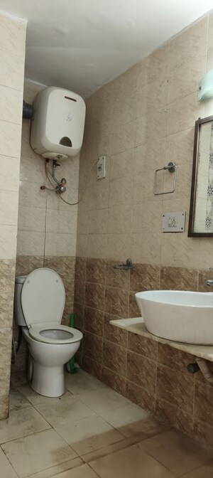 Bathroom in 3 BHK Apartment at Vasant Kunj – for Sale