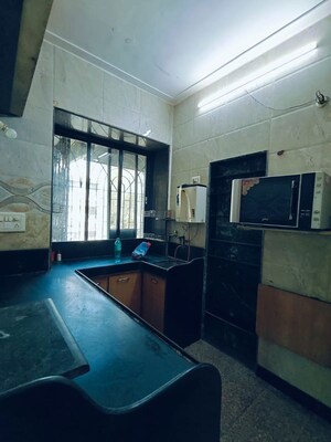 Kitchen in 2 BHK Apartment at Satya Jivan CHS, Lbs Marg – for Rent