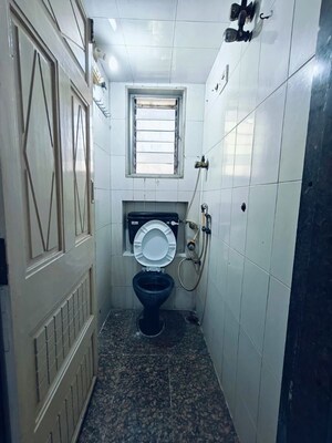 Bathroom in 2 BHK Apartment at Satya Jivan CHS, Lbs Marg – for Rent