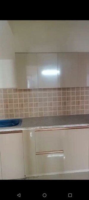 Kitchen in  Apartment at Mahagun My Woods, Sector 16c Greater Noida – for Rent