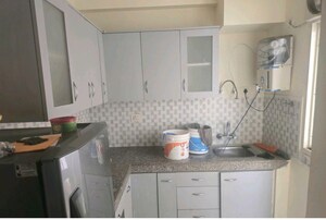 Kitchen in 2 BHK Apartment at Supertech Czar Suites, Omicron I Greater Noida – for Rent