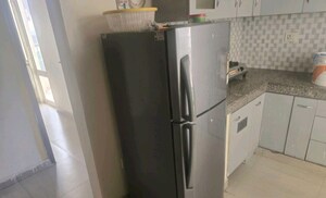Kitchen in 2 BHK Apartment at Supertech Czar Suites, Omicron I Greater Noida – for Rent