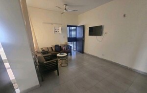 Living Room in 2 BHK Apartment at Supertech Czar Suites, Omicron I Greater Noida – for Rent
