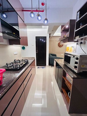 Kitchen in 2 BHK Apartment at Puranik Tokyo Bay Phase 2A, Kasarvadavali – for Rent