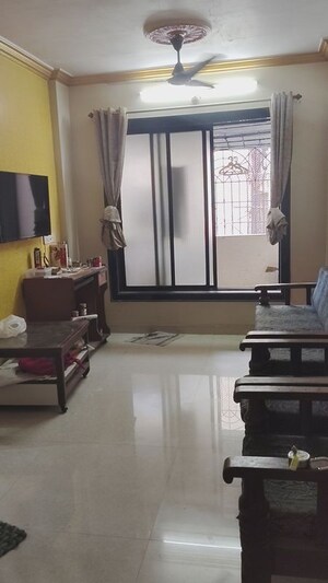 Living Room in 1 BHK Apartment at Kopar Khairane – for Rent