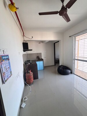 Living Room in Studio Apartment at Puranik Tokyo Bay Phase 3A, Kasarvadavali – for Rent