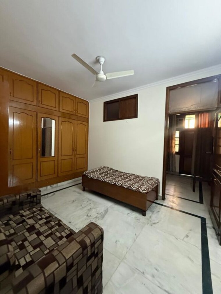 Bedroom, kalkaji 2 Bedroom 100 Sq.Yd. Builder Floor In Kalkaji Delhi 10449592