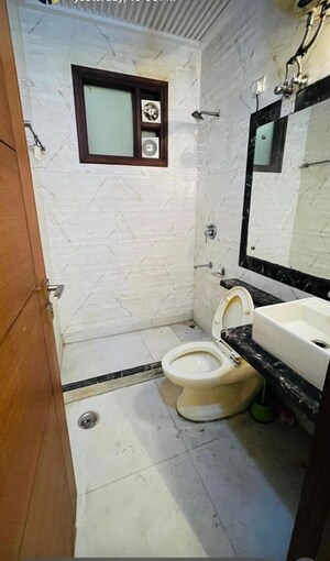 Bathroom in 2 BHK Builder Floor at Kalkaji – for Rent