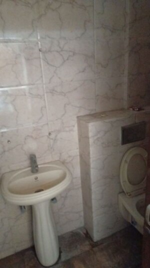 Bathroom in 4 BHK Apartment at Sector 24 – for Sale