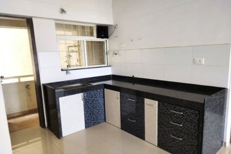 Kitchen, mantra-insignia 1.5 Bedroom 680 Sq.Ft. Apartment In Mundhwa Pune 10449922