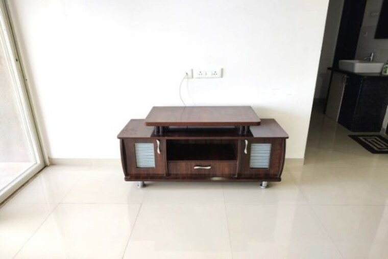 Living Room, mantra-insignia 1.5 Bedroom 680 Sq.Ft. Apartment In Mundhwa Pune 10449922