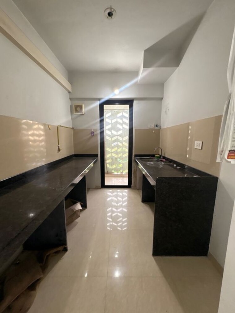 Kitchen, lodha-palava-city-lakeshore-greens 2 Bedroom 734 Sq.Ft. Apartment In Dombivli East Thane 10449957