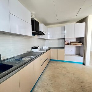 Kitchen in 3.5 BHK Apartment at Mahagun Mezzaria, Sector 78 – for Rent