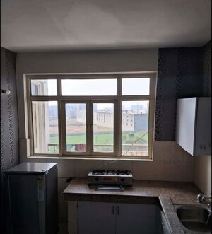 Kitchen in 1 BHK Apartment at NK Sharma Savitry Greens, Lohgarh – for Rent