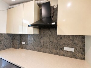 Kitchen in 3 BHK Apartment at Mahindra Luminare, Sector 59 – for Sale