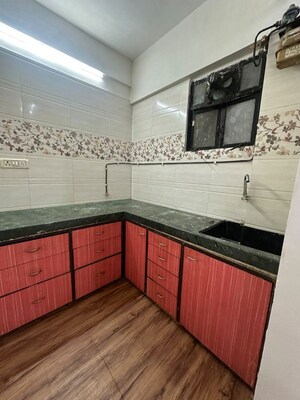 Kitchen in 1 BHK Apartment at Golders Green CHS, Borivali West – for Rent