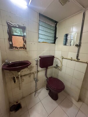Bathroom in 1 BHK Apartment at Golders Green CHS, Borivali West – for Rent