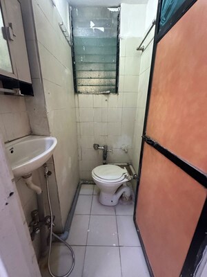 Bathroom in 1 BHK Apartment at Golders Green CHS, Borivali West – for Rent