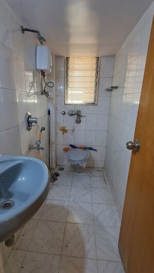 Bathroom in 2 BHK Apartment at Savita Chhaya CHS, Bandra West – for Rent