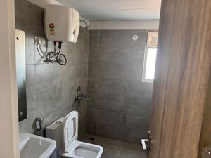 Bathroom in 2 BHK Builder Floor at Vatika India Next, Sector 82 – for Rent