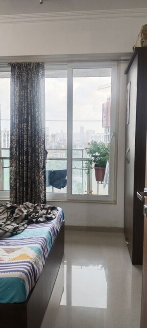 Bedroom in 3 BHK Apartment at Neelam Senroofs, Nahur East – for Rent