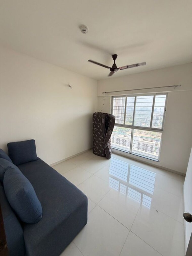 Living Room, mantra-monarch 2 Bedroom 800 Sq.Ft. Apartment In Balewadi Pune 10450377