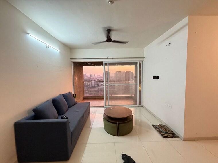Living Room, mantra-monarch 2 Bedroom 800 Sq.Ft. Apartment In Balewadi Pune 10450377