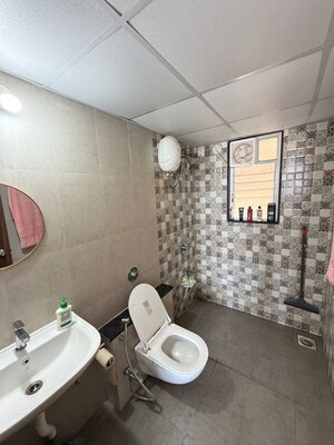 Bathroom in 2 BHK Apartment at Mantra Monarch, Balewadi – for Rent