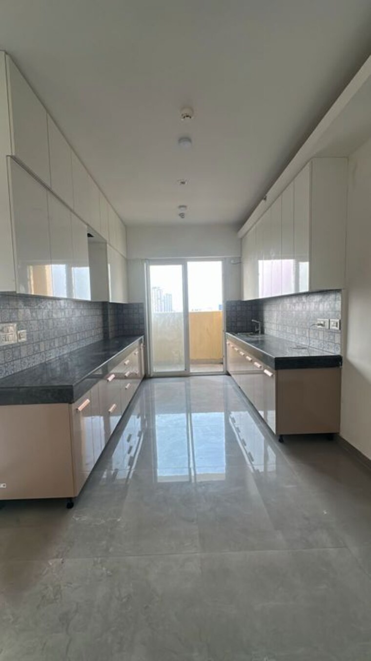 Kitchen, tulip-yellow 3 Bedroom 1704 Sq.Ft. Apartment In Sector 69 Gurgaon 10450421