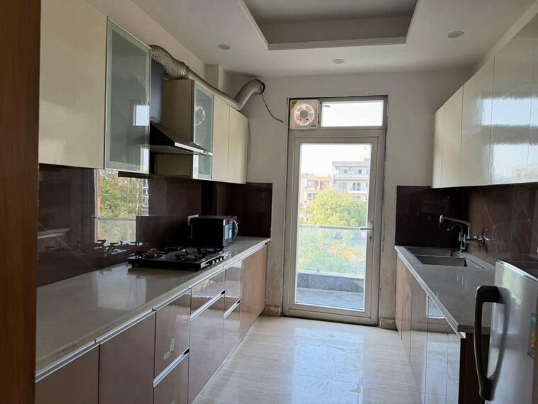 Kitchen, bestech-park-view-spa-next 3 Bedroom 1965 Sq.Ft. Apartment In Sector 67 Gurgaon 10450339