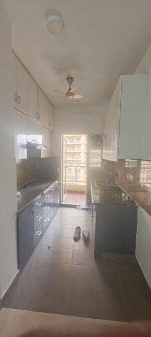 Kitchen in 3 BHK Apartment at Amrapali Zodiac, Sector 120 – for Rent