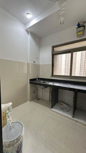 Kitchen in 1 BHK Apartment at Lodha Splendora, Ghodbunder Road – for Rent