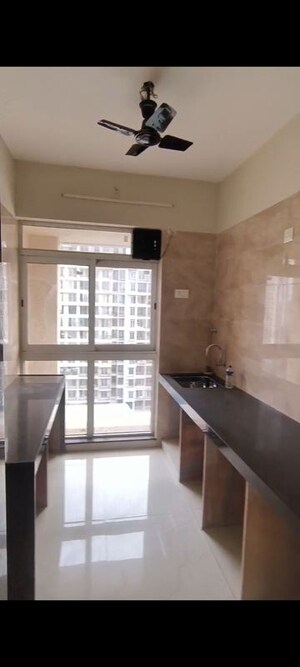 Kitchen in 2 BHK Apartment at Satyam Oasis, Taloja – for Rent