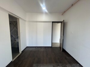 Room in 2 BHK Apartment at Chandak Cornerstone, Worli – for Rent