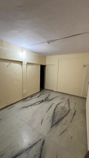 Bedroom in 2 BHK Apartment at Dhaval Sunrise Charkop, Kandivali West – for Rent