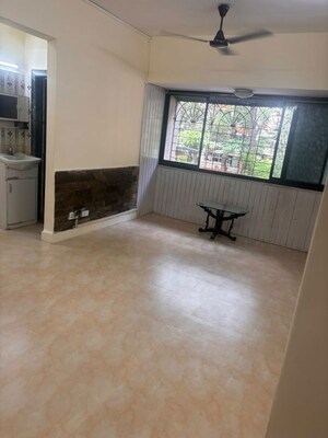 Living Room in 1 BHK Apartment at Harsiddh Park CHS, Vasant Vihar – for Rent