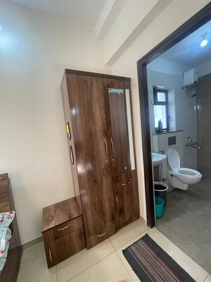 Living Room in 1 BHK Apartment at Ahura Pearl Suites, Mundhwa – for Rent