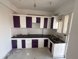 Kitchen in 3 BHK Apartment at Casa Woodstock, Sector 16c Greater Noida – for Sale