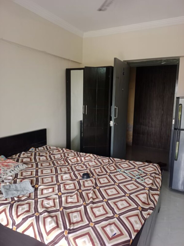Bedroom, royal-palms-garden-view 1 RK 340 Sq.Ft. Apartment In Goregaon East Mumbai 10450864