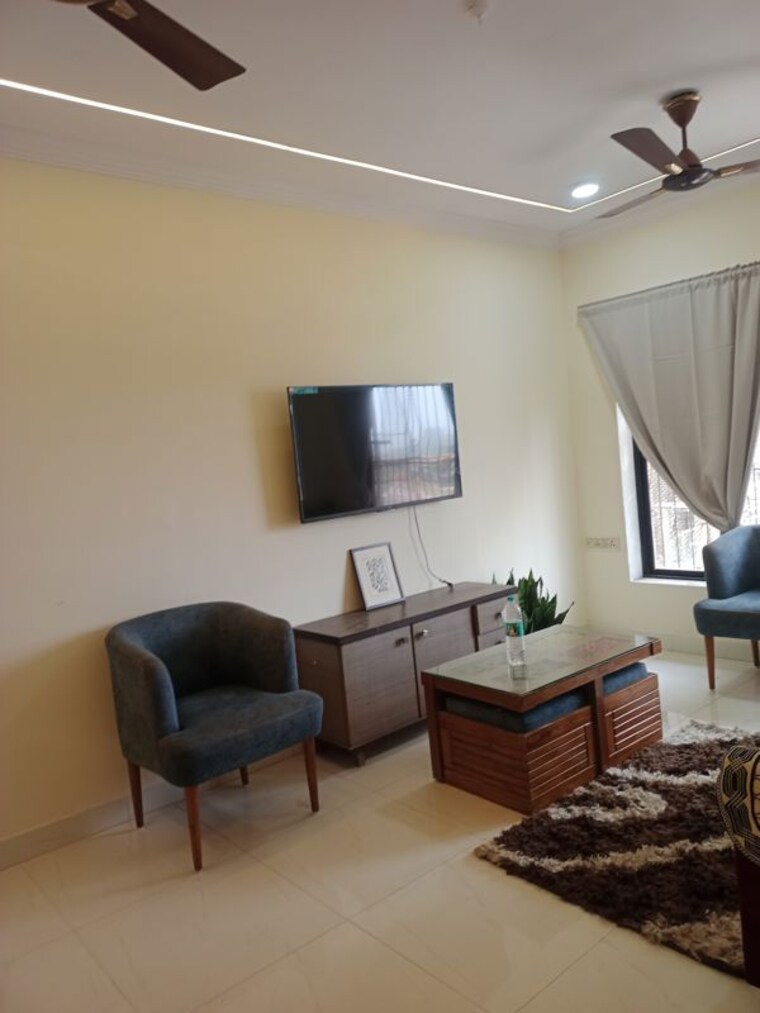 Living Room, royal-palms-garden-view 2 Bedroom 908 Sq.Ft. Apartment In Goregaon East Mumbai 10450911
