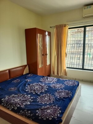 Bedroom in 2 BHK Apartment at Royal Palms Garden View, Goregaon East – for Rent