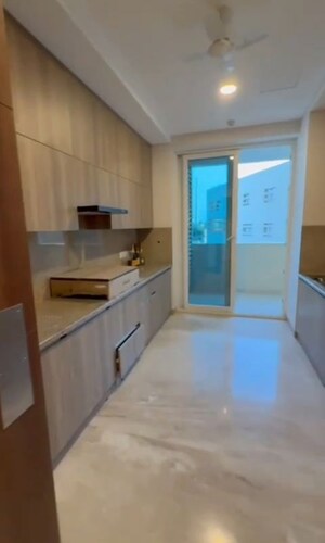 Kitchen in 4 BHK Apartment at Ambience Creacions, Sector 22 – for Rent