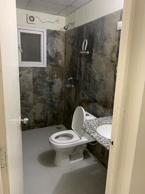 Bathroom in 3 BHK Apartment at Pardos Okas Residency, Sushant Golf City – for Rent