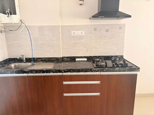 Kitchen in Studio Apartment at Gera World of Joy, Kharadi – for Sale
