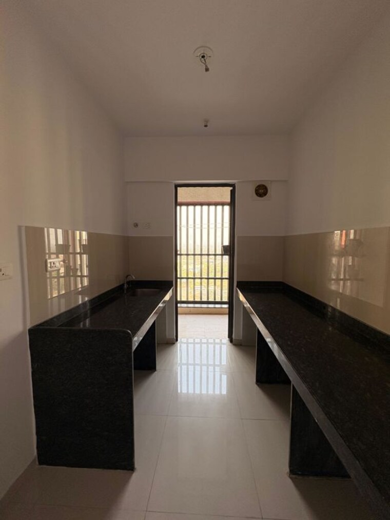 Kitchen, lodha-palava-city-lakeshore-greens 1 Bedroom 467 Sq.Ft. Apartment In Dombivli East Thane 10451362